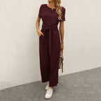 Figursyet outfit til fest og aften – Jumpsuit med strømpebåndsdetalje til kvinder