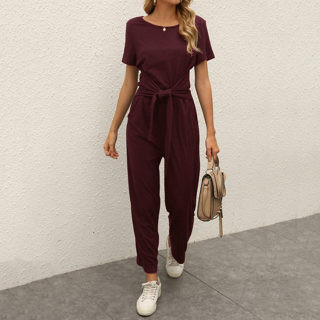 Figursyet outfit til fest og aften – Jumpsuit med strømpebåndsdetalje til kvinder