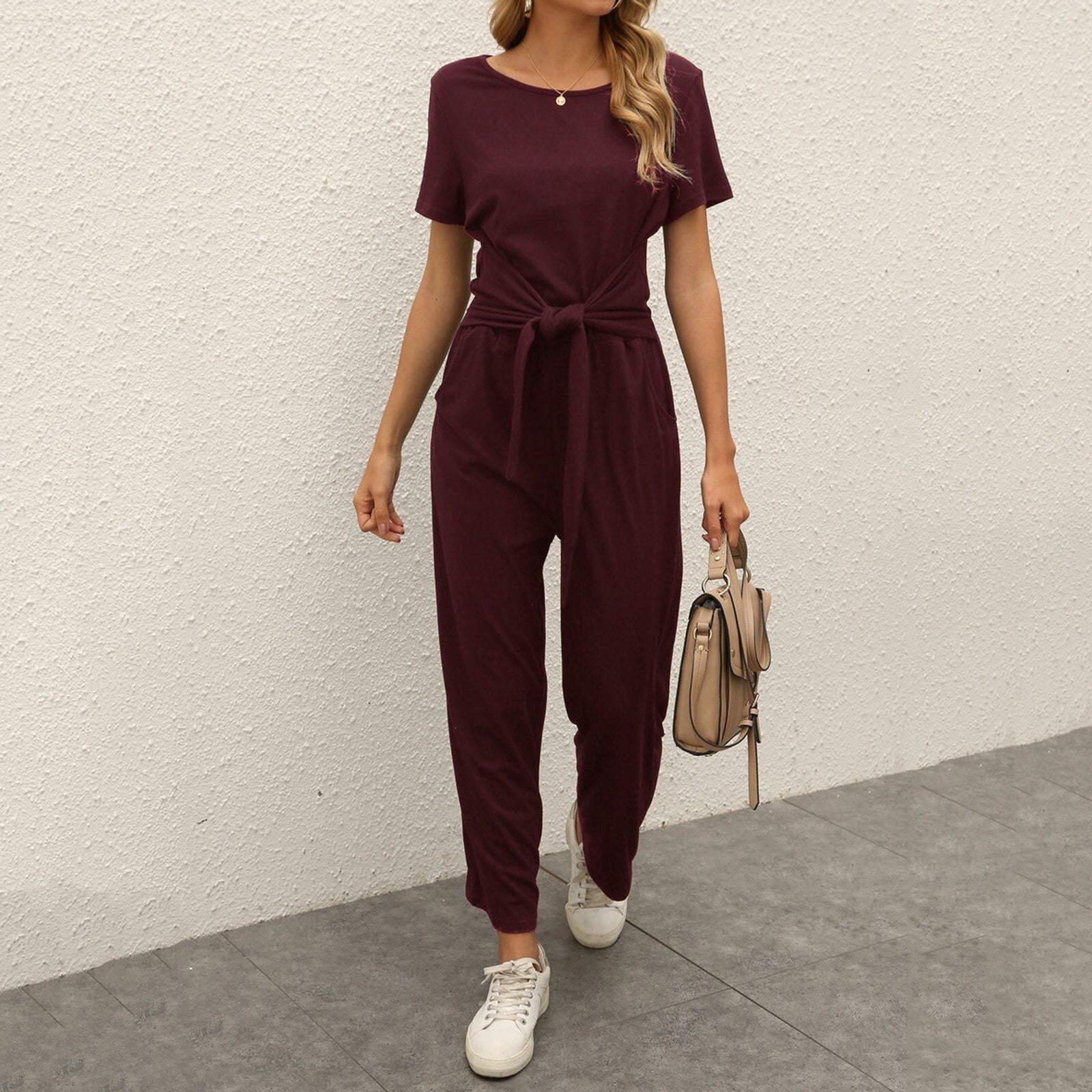 Figursyet outfit til fest og aften – Jumpsuit med strømpebåndsdetalje til kvinder