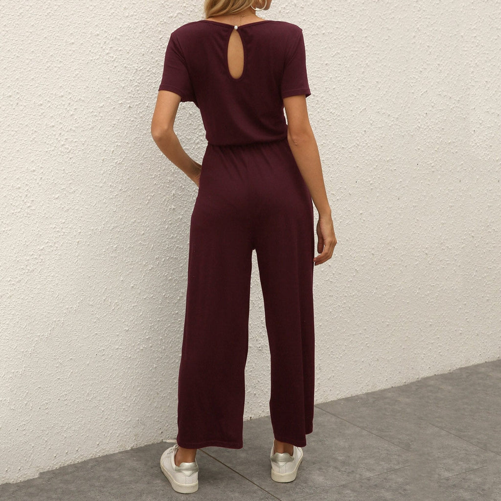Figursyet outfit til fest og aften – Jumpsuit med strømpebåndsdetalje til kvinder