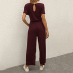 Figursyet outfit til fest og aften – Jumpsuit med strømpebåndsdetalje til kvinder