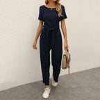 Figursyet outfit til fest og aften – Jumpsuit med strømpebåndsdetalje til kvinder