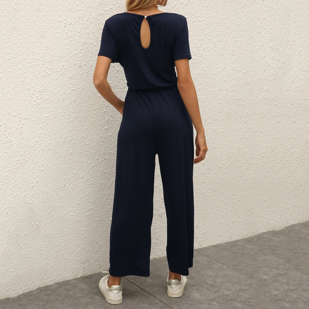 Figursyet outfit til fest og aften – Jumpsuit med strømpebåndsdetalje til kvinder