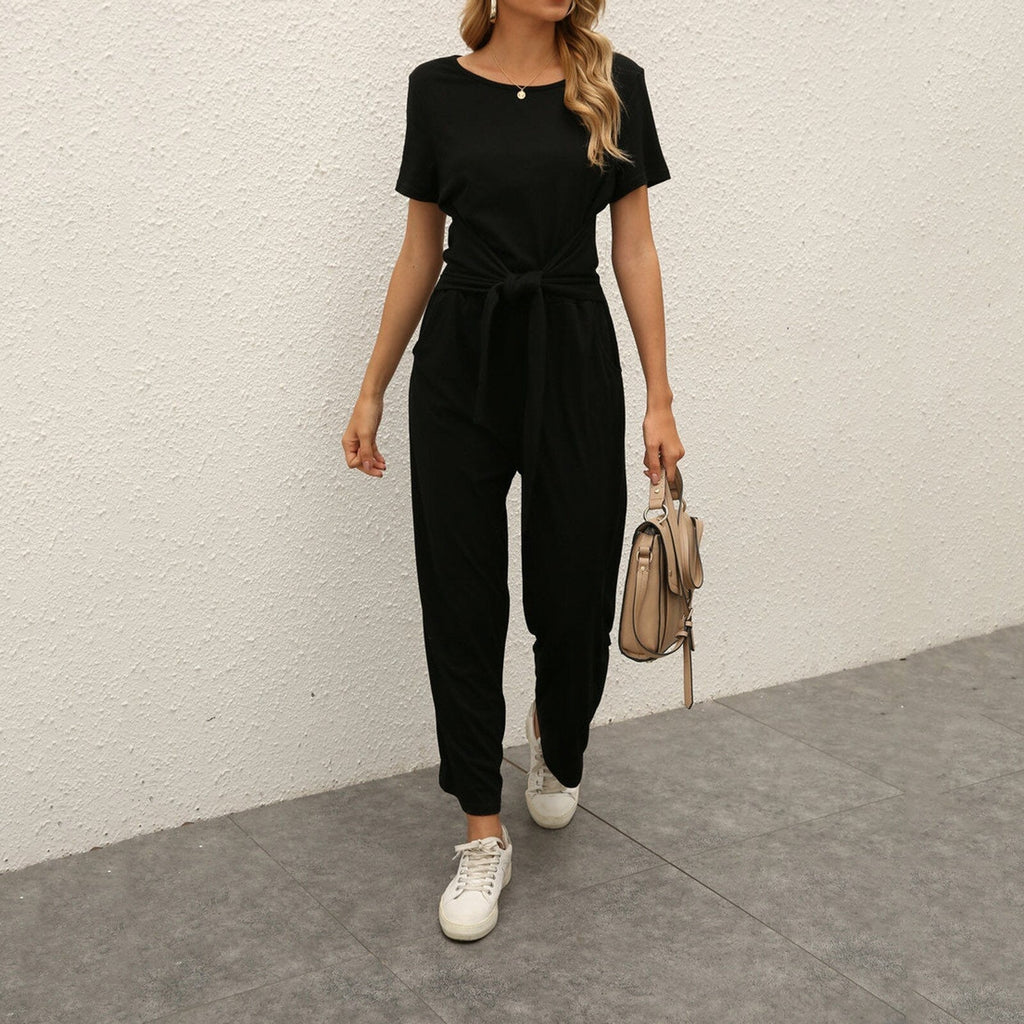 Figursyet outfit til fest og aften – Jumpsuit med strømpebåndsdetalje til kvinder