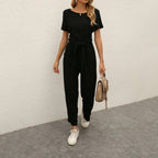 Figursyet outfit til fest og aften – Jumpsuit med strømpebåndsdetalje til kvinder