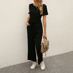Figursyet outfit til fest og aften – Jumpsuit med strømpebåndsdetalje til kvinder