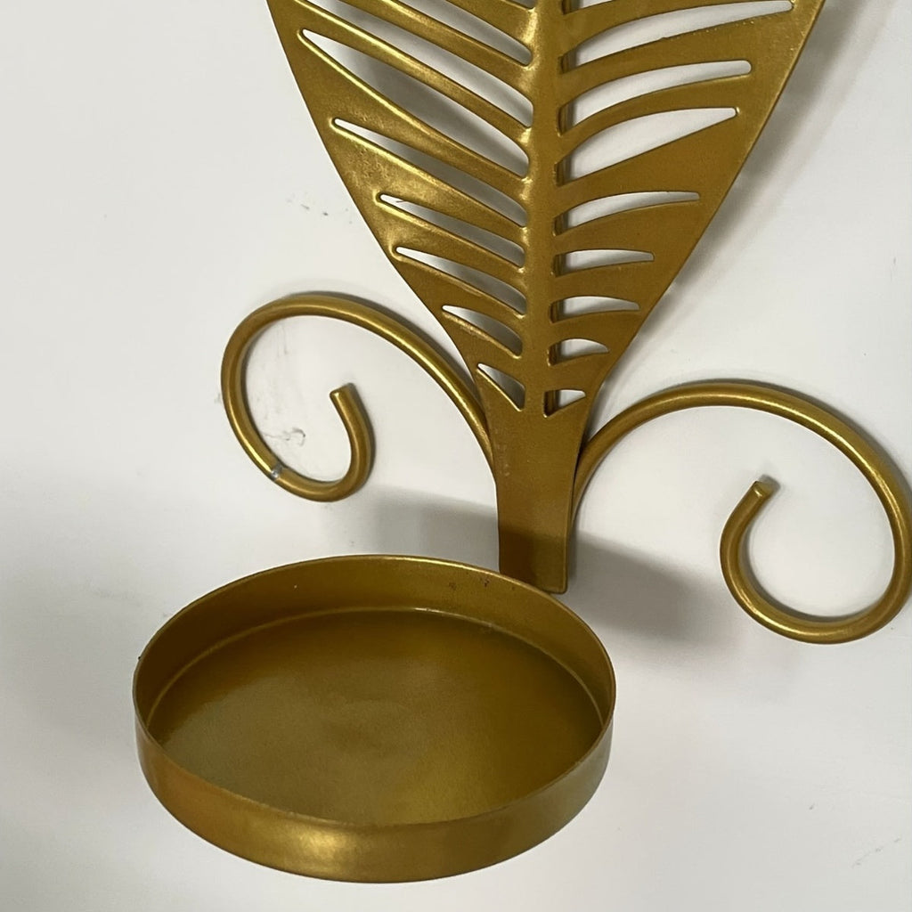 Væghængte lysestager med bladmønster til indendørs brug