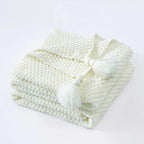 Warm home textiles for sofa and relaxation – Wool blanket with tassels