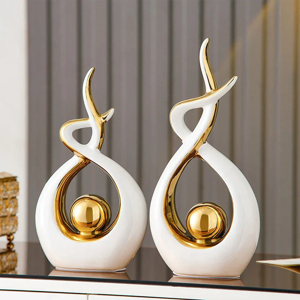 Abstract decorative figure in ceramic with gold finish