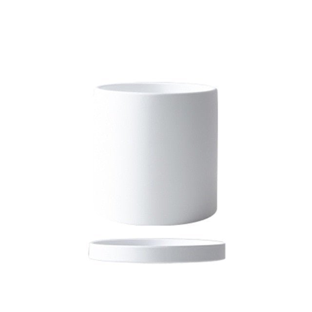 Ceramic flower pot with saucer for indoor use