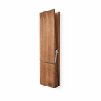 Towel holder shaped like a clothespin in wood