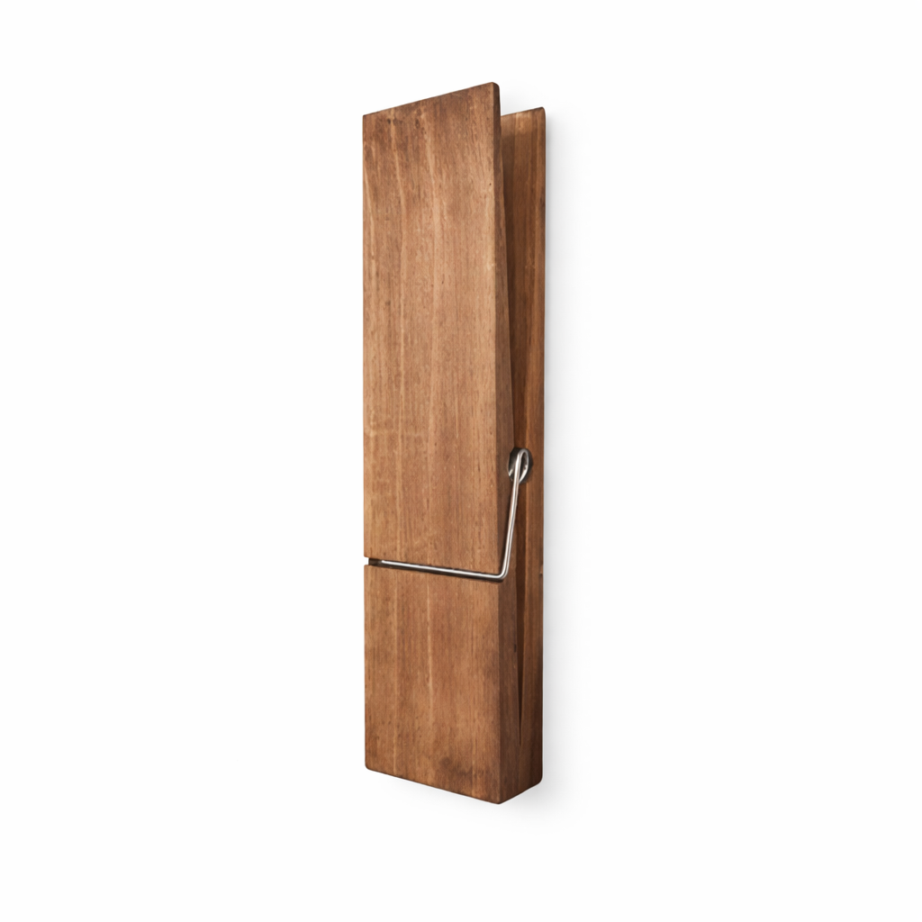 Towel holder shaped like a clothespin in wood