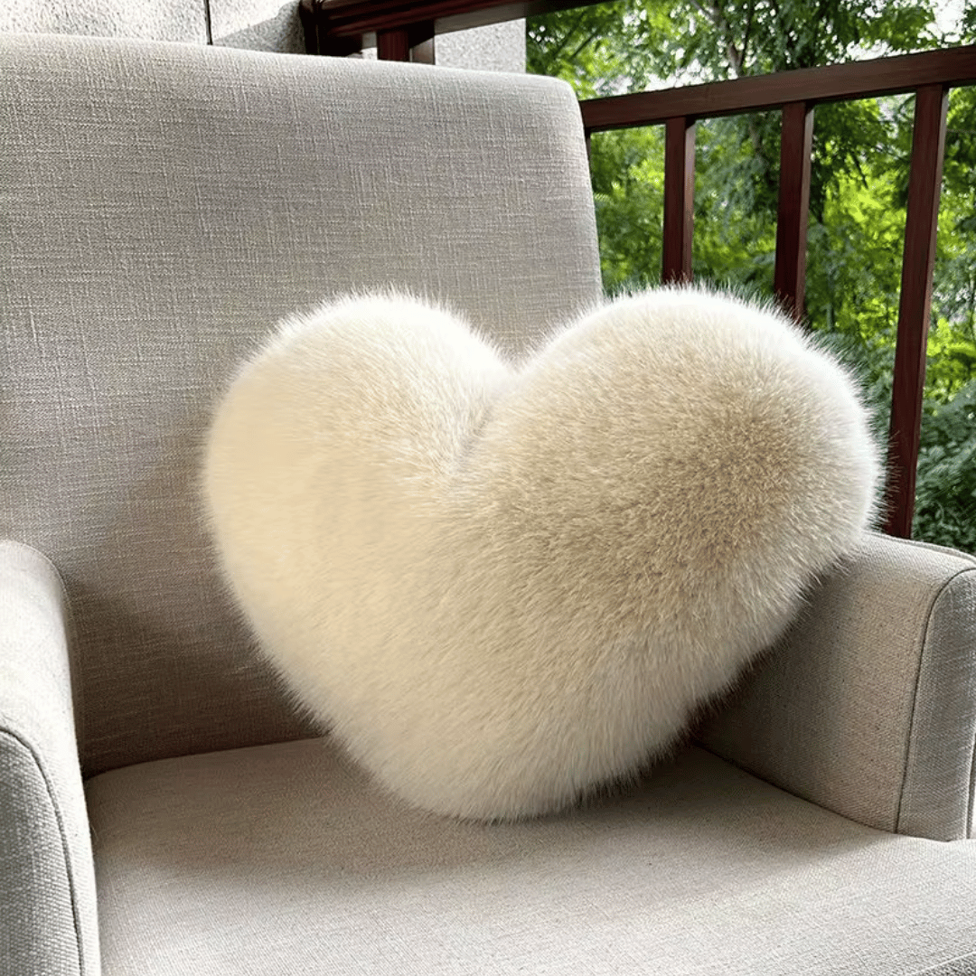 Heart-shaped decorative pillow in faux fur