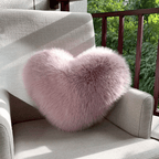 Heart-shaped decorative pillow in faux fur