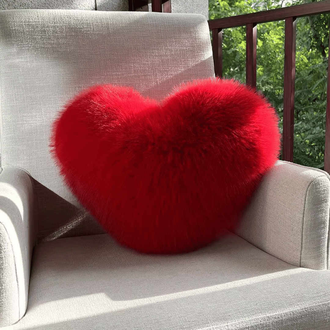 Heart-shaped decorative pillow in faux fur