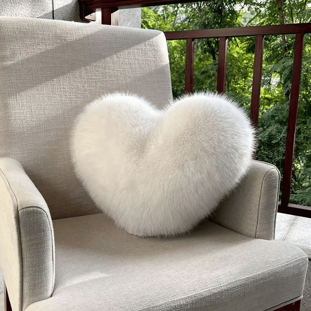 Heart-shaped decorative pillow in faux fur