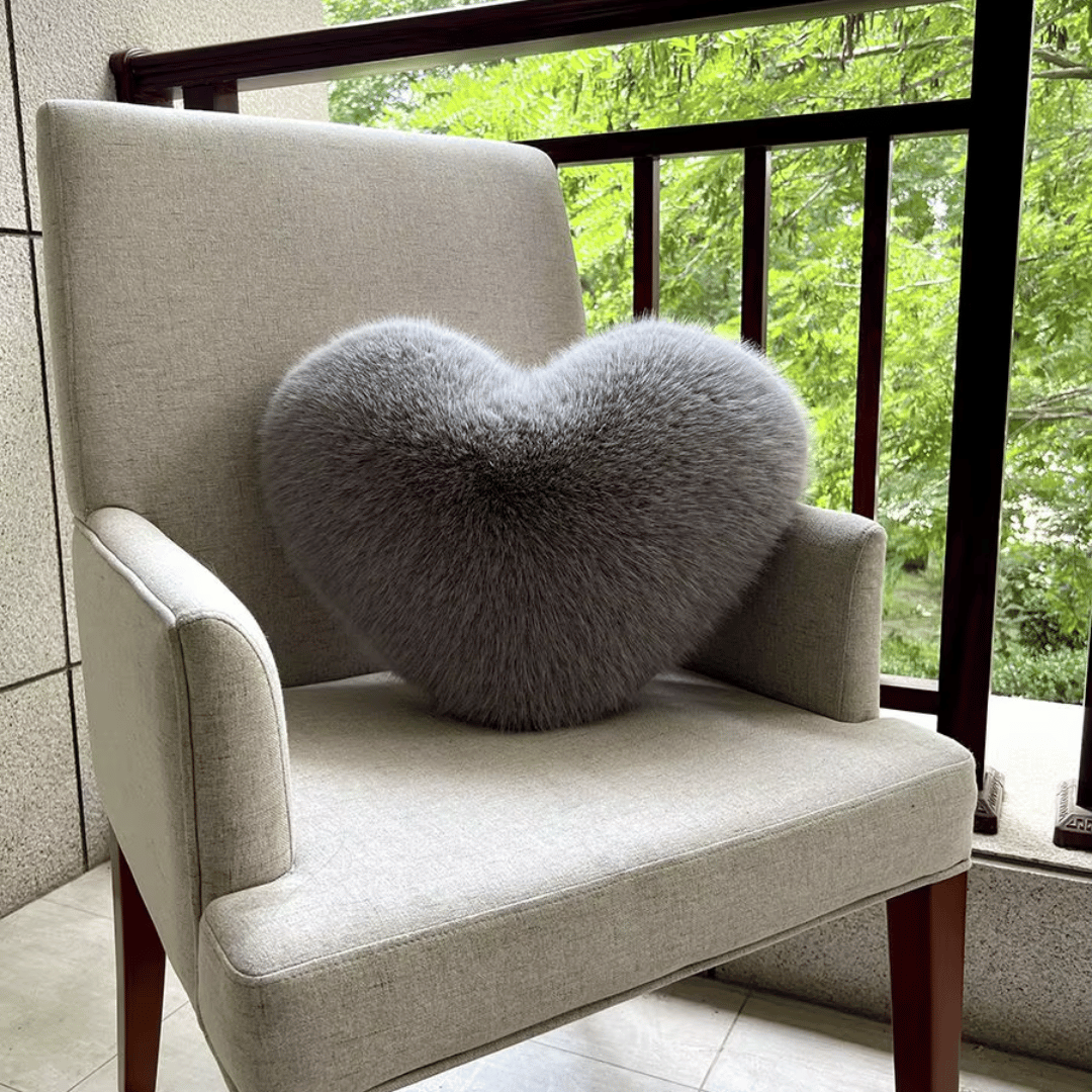 Heart-shaped decorative pillow in faux fur