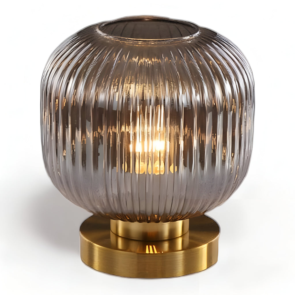 Table lamp with ribbed glass for indoor use
