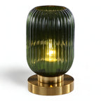 Table lamp with ribbed glass for indoor use