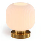Table lamp with ribbed glass for indoor use