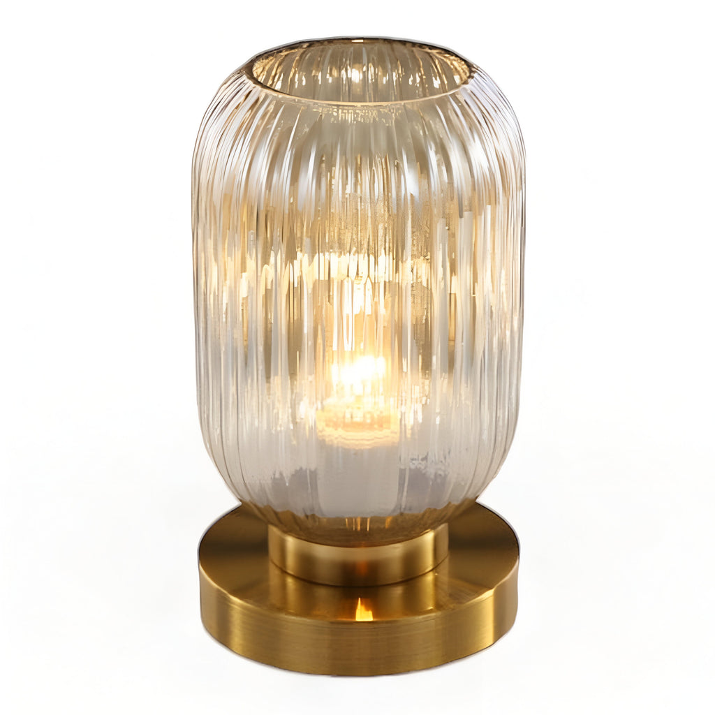 Table lamp with ribbed glass for indoor use