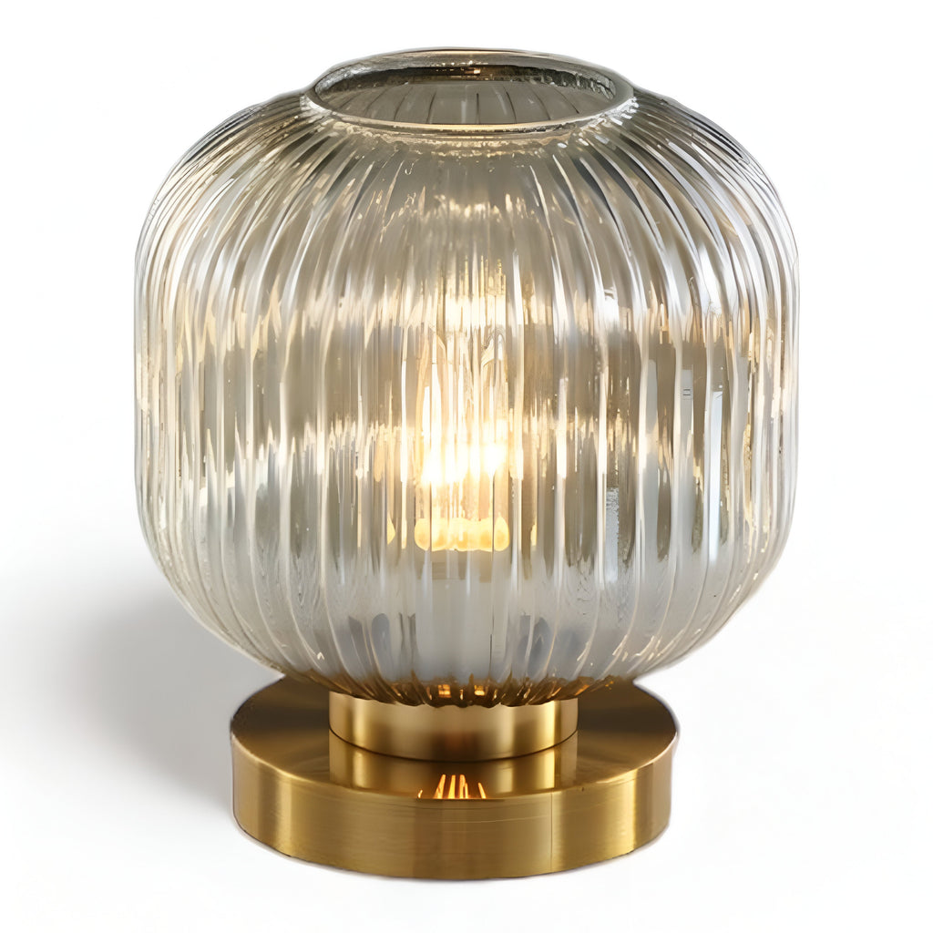 Table lamp with ribbed glass for indoor use