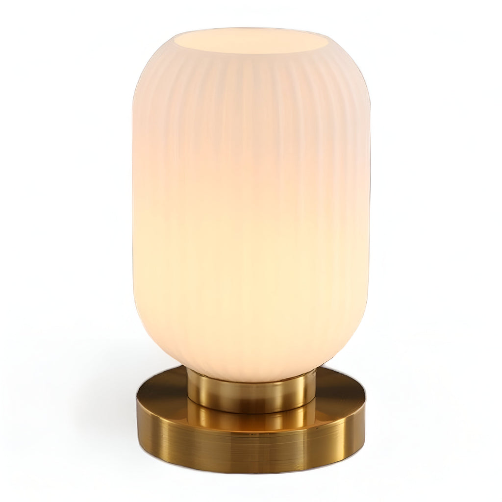 Table lamp with ribbed glass for indoor use