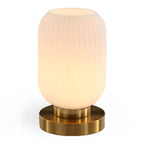 Table lamp with ribbed glass for indoor use