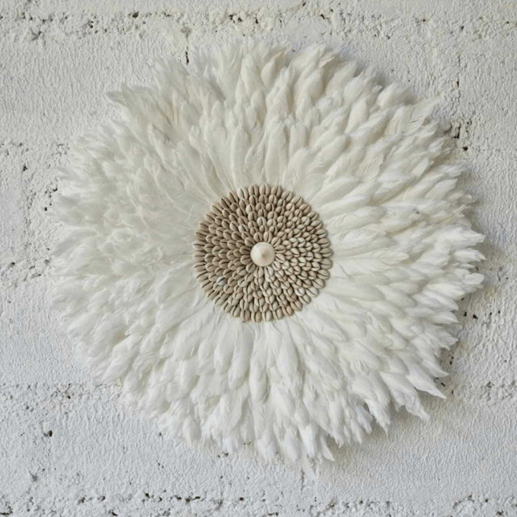 Decorative wall decoration with white feathers