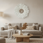 Decorative wall decoration with white feathers