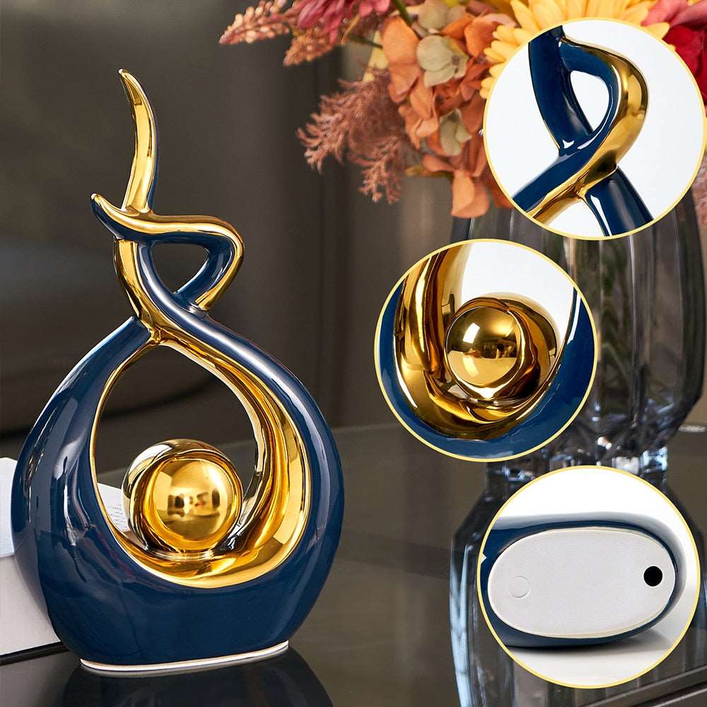 Abstract decorative figure in ceramic with gold finish