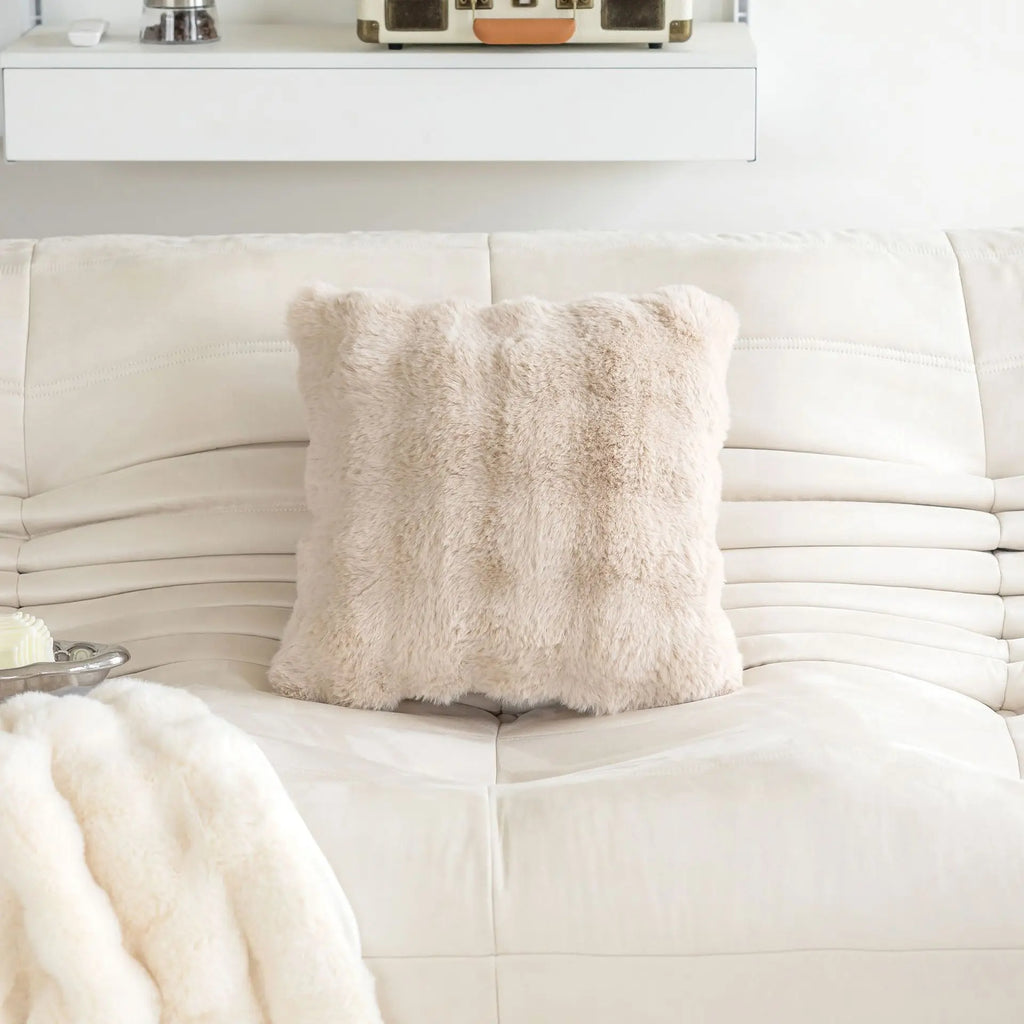 Decorative pillow in faux rabbit fur in solid color design