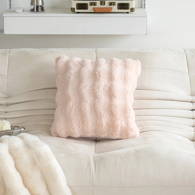 Decorative pillow in faux rabbit fur in solid color design