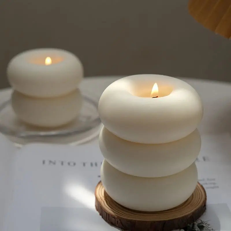 Aromatherapy candle in donut shape for indoor use
