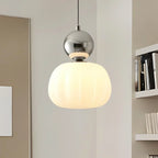 Pendant lamp with glass globe and decorative top for indoor use