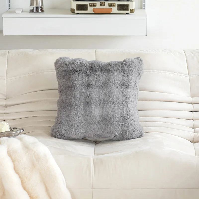 Decorative pillow in faux rabbit fur in solid color design
