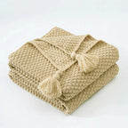 Warm home textiles for sofa and relaxation – Wool blanket with tassels