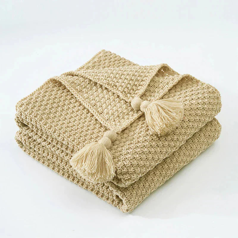 Warm home textiles for sofa and relaxation – Wool blanket with tassels