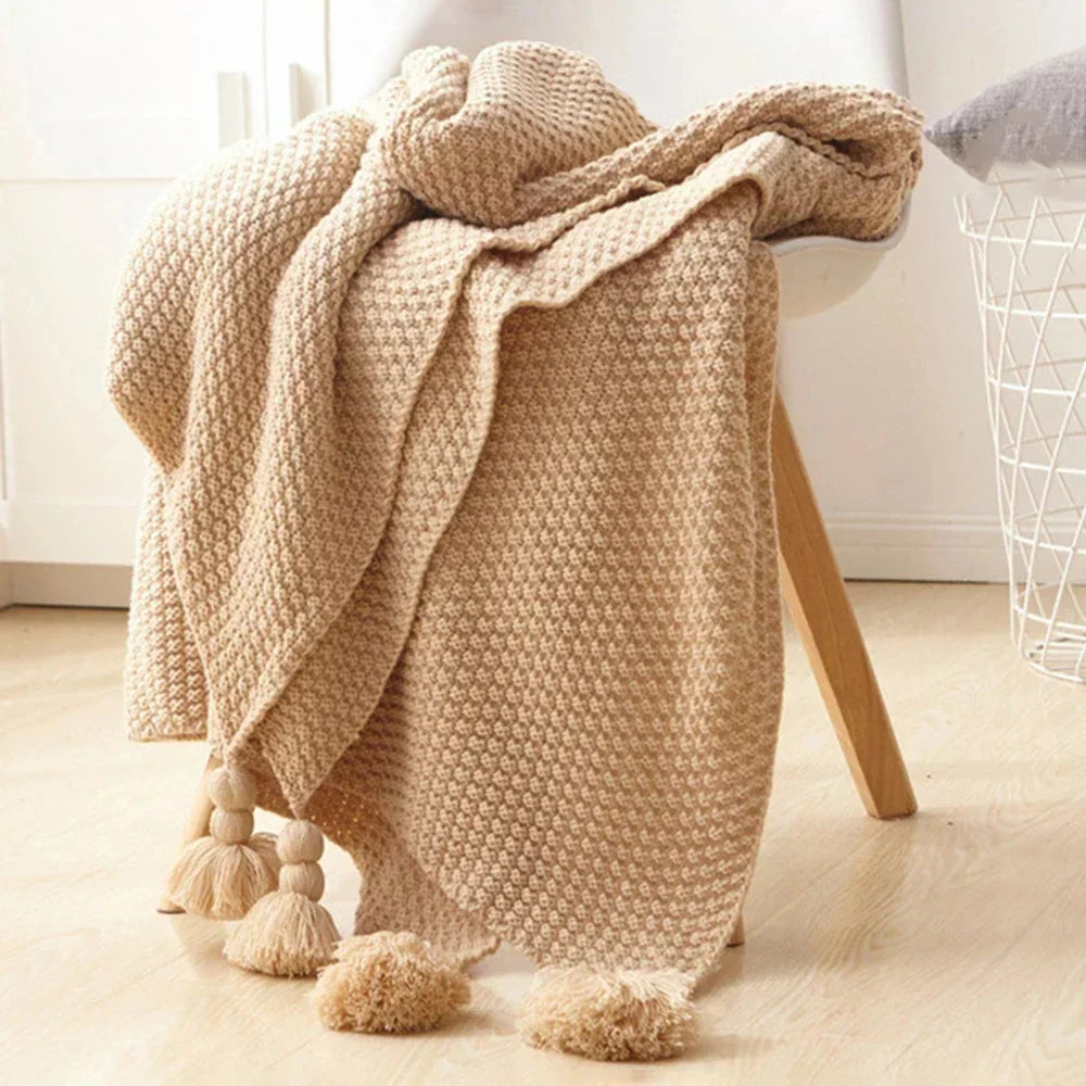 Warm home textiles for sofa and relaxation – Wool blanket with tassels