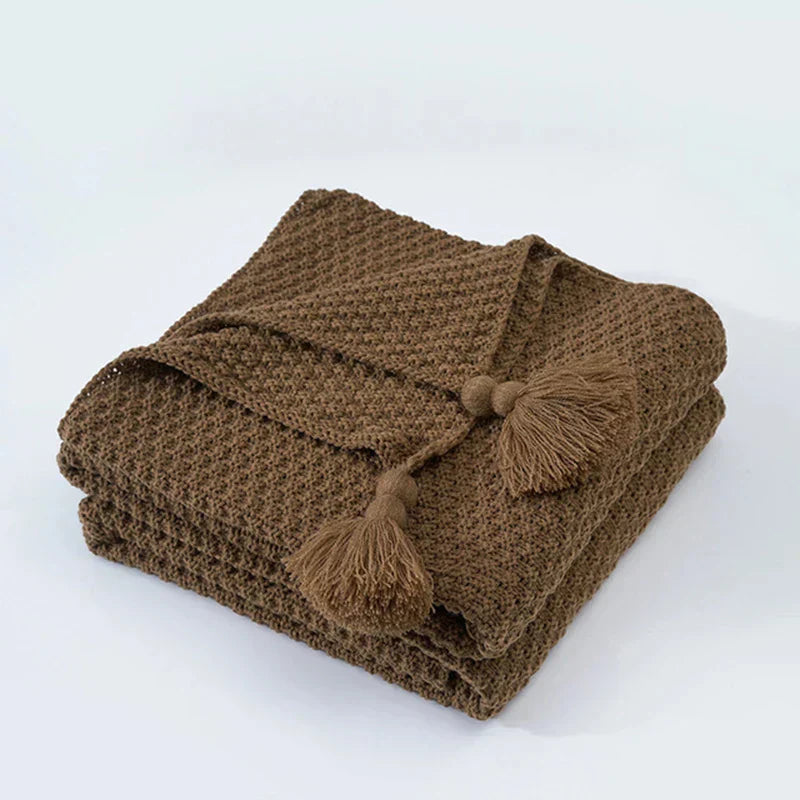 Warm home textiles for sofa and relaxation – Wool blanket with tassels