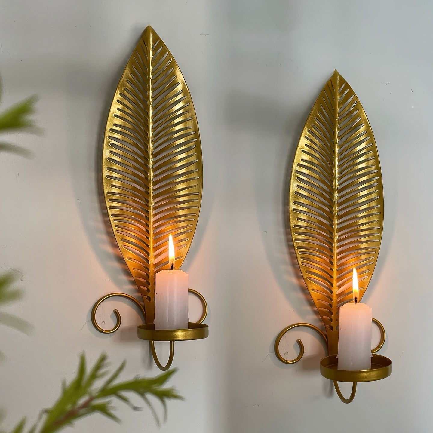 Væghængte lysestager med bladmønster til indendørs brug
