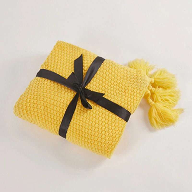 Warm home textiles for sofa and relaxation – Wool blanket with tassels