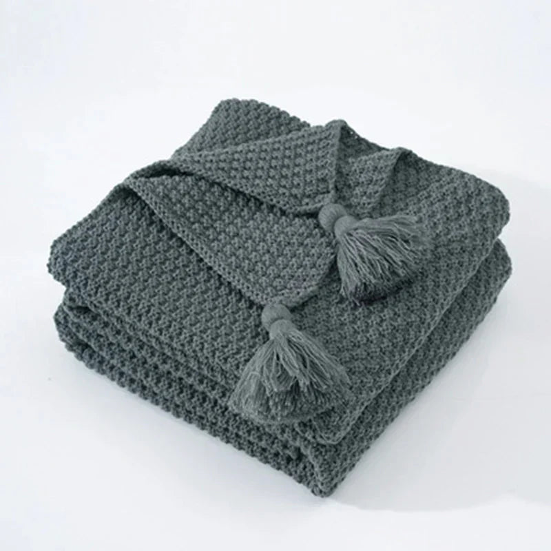 Warm home textiles for sofa and relaxation – Wool blanket with tassels
