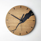 Round wall clock in wood with black details