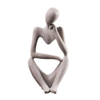 Skulptur af siddende figur til indendørs brug