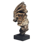 Gold-colored sculpture for indoor use