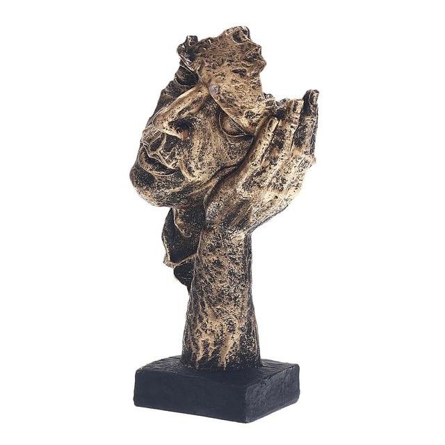 Gold-colored sculpture for indoor use