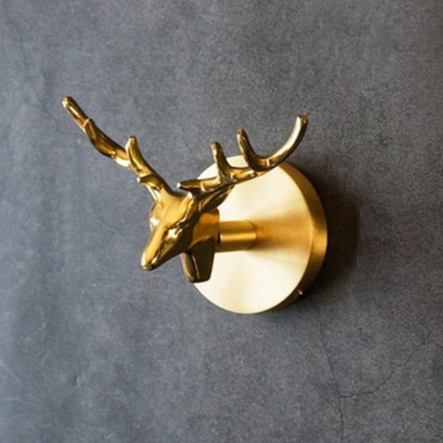 Decorative hanging for entrance and wall – Coat hooks in brass with animal shape and gold finish