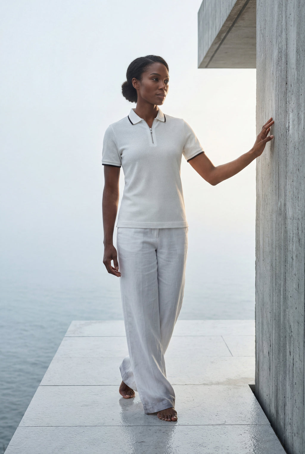 Casual polo for everyday use – Textured polo with half zipper for women