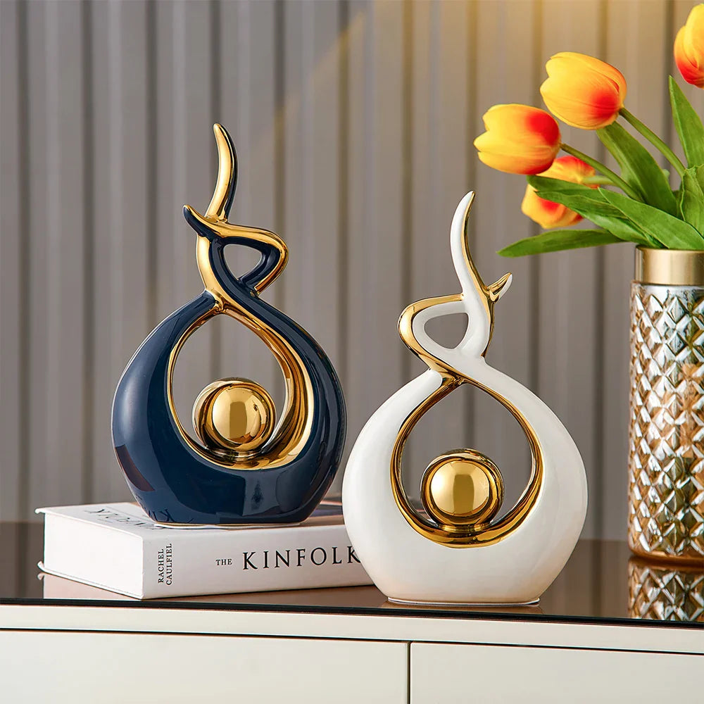 Abstract decorative figure in ceramic with gold finish